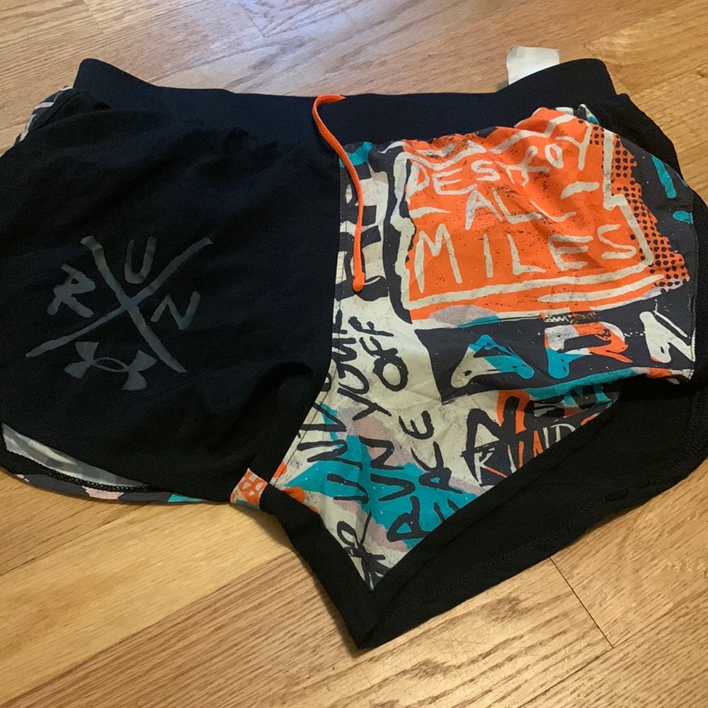 Under armour run shorts. Size small/medium.